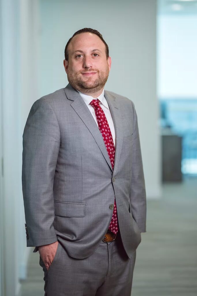 Confident professional in gray business suit
