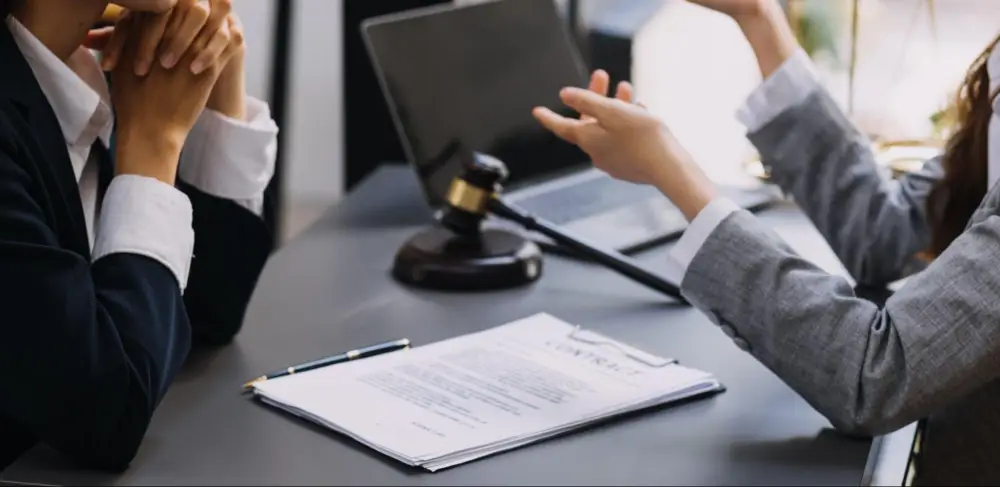 Legal consultation discussion before evaluating digital-first property damage firms